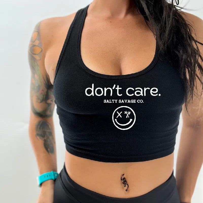 Ladies "don’t care." Racerback Crop Tank activewear tank top